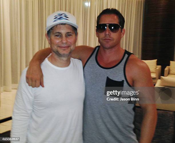 DuJour Media Founder Jason Binn and entrepreneur Cy Waits pose circa January 2014 in Miami, Florida.