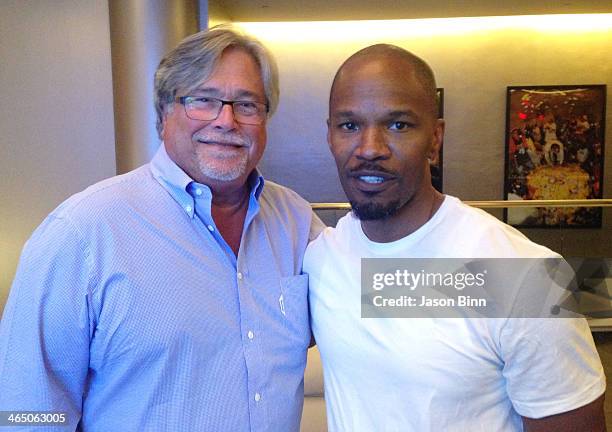 Owner of the NBA Miami Heat Micky Arison and Jamie Foxx at the Miami Heat NBA game on January 2, 2014 in Miami.