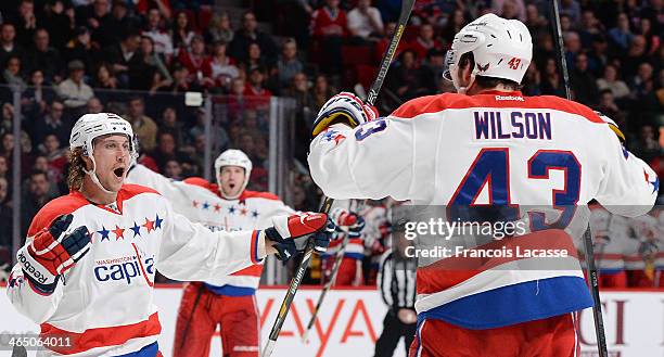 Jay Beagle of the Washington Capitals, celebrates with teammate Tom Wilson, after scoring a goal against the Montreal Canadiens during the NHL game...