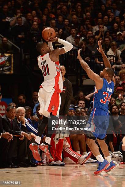 January 25: Terrence Ross of the Toronto Raptors shoots against the Los Angeles Clippers on January 25, 2014 at the Air Canada Centre in Toronto,...