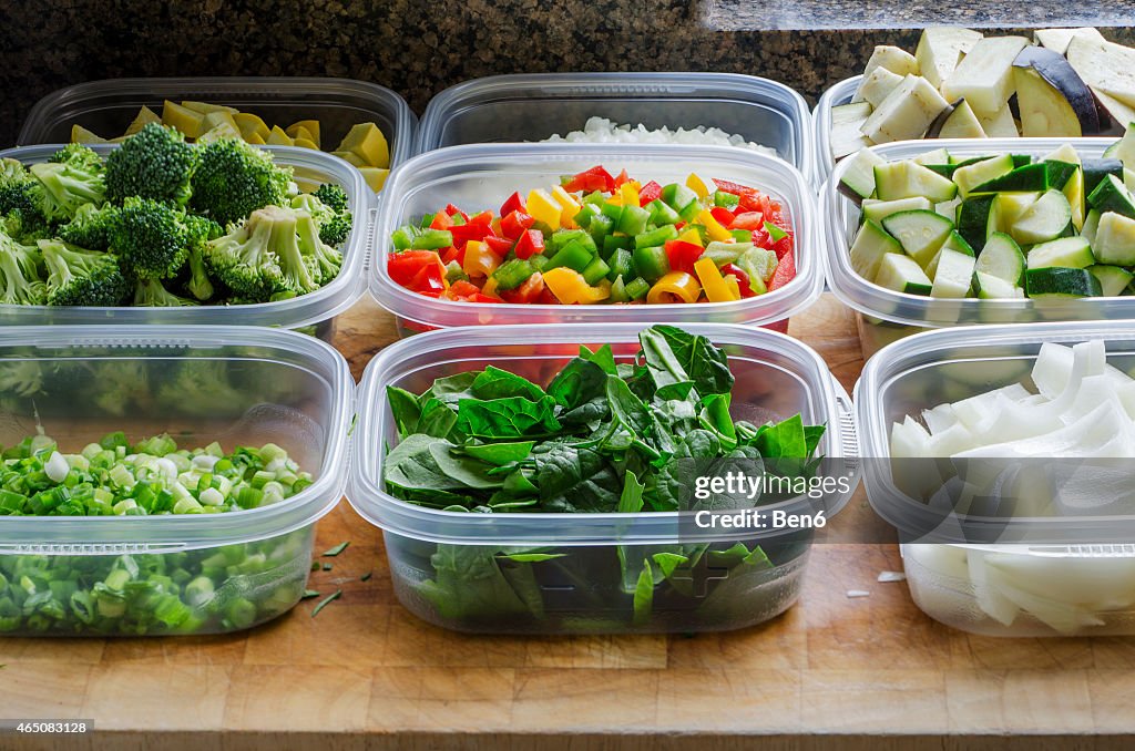 Chopped vegetables in plastic containers