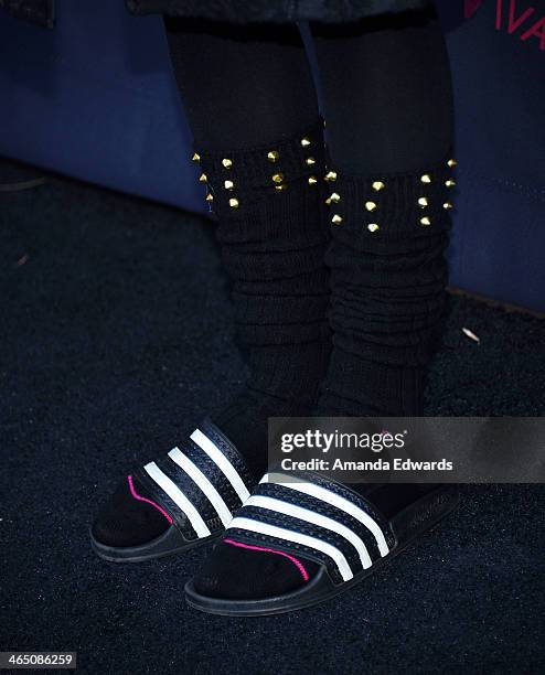 Singer/songwriter Grimes arrives at the Roc Nation Pre-GRAMMY Brunch presented by MAC Viva Glam on January 25, 2014 in Los Angeles, California.