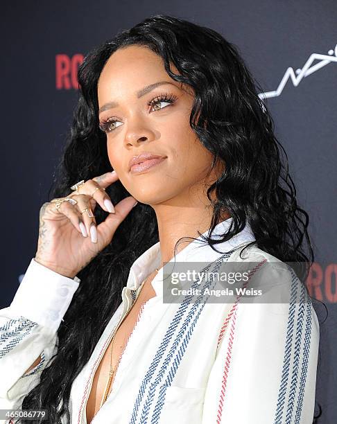 Recording artist Rihanna arrives at the Roc Nation Pre-Grammy brunch presented by MAC Viva Glam at a private residency on January 25, 2014 in Los...