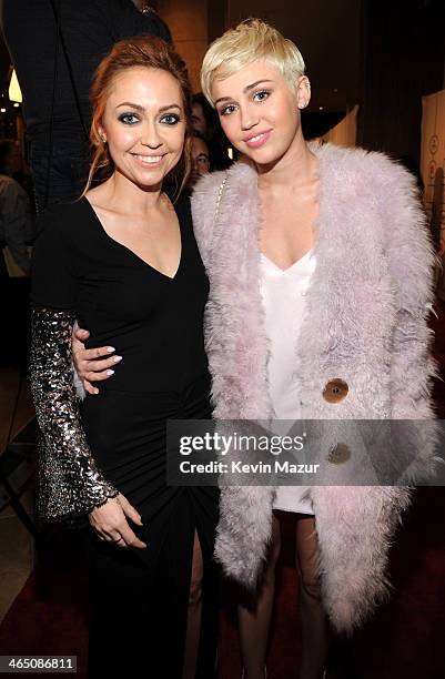 Brandi Cyrus and Miley Cyrus attend the 56th annual GRAMMY Awards Pre-GRAMMY Gala and Salute to Industry Icons honoring Lucian Grainge at The Beverly...