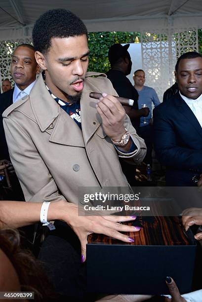 Rapper J. Cole attends the Roc Nation Pre-GRAMMY Brunch Presented by MAC Viva Glam at Private Residence on January 25, 2014 in Beverly Hills,...