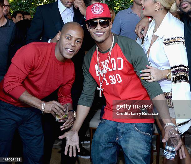 Tyran 'Tata' Smith and rapper T.I. Attend the Roc Nation Pre-GRAMMY Brunch Presented by MAC Viva Glam at Private Residence on January 25, 2014 in...