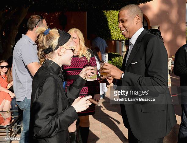 Musician Grimes and rapper/producer Jay-Z attend the Roc Nation Pre-GRAMMY Brunch Presented by MAC Viva Glam at Private Residence on January 25, 2014...
