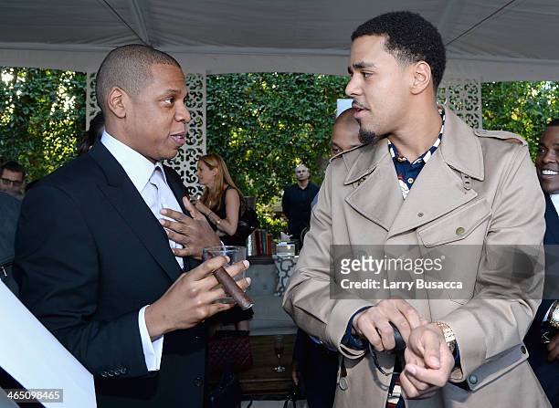 Rapper/producer Jay-Z and rapper J. Cole attend the Roc Nation Pre-GRAMMY Brunch Presented by MAC Viva Glam at Private Residence on January 25, 2014...