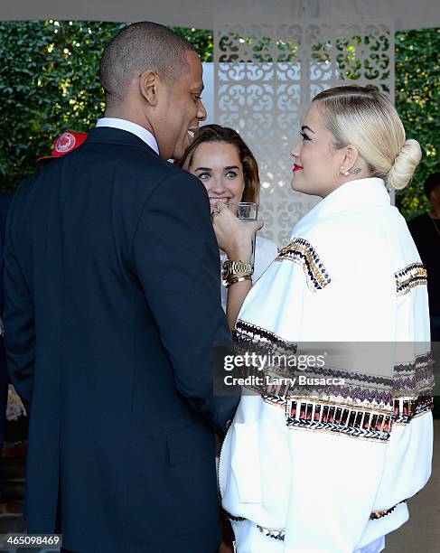 Rapper/producer Jay-Z and recording artist Rita Ora attend the Roc Nation Pre-GRAMMY Brunch Presented by MAC Viva Glam at Private Residence on...