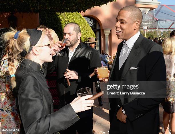 Musician Grimes and rapper/producer Jay-Z attend the Roc Nation Pre-GRAMMY Brunch Presented by MAC Viva Glam at Private Residence on January 25, 2014...