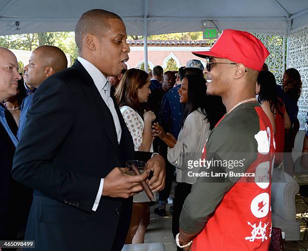 Rapper/producer Jay-Z and rapper T.I. Attend the Roc Nation Pre-GRAMMY Brunch Presented by MAC Viva Glam at Private Residence on January 25, 2014 in...