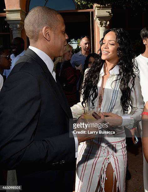 Rapper/producer Jay-Z and recording artist Rihanna attend the Roc Nation Pre-GRAMMY Brunch Presented by MAC Viva Glam at Private Residence on January...
