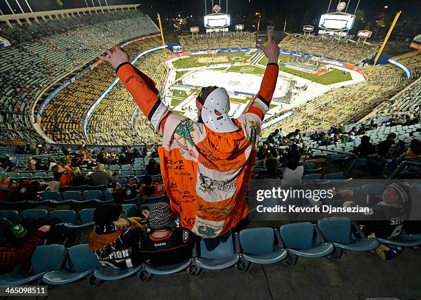 Anaheim Ducks fan David Harrington reacts prior to the start of the 2014 Coors Light Stadium Series game between the Los Angeles Kings and Anaheim...