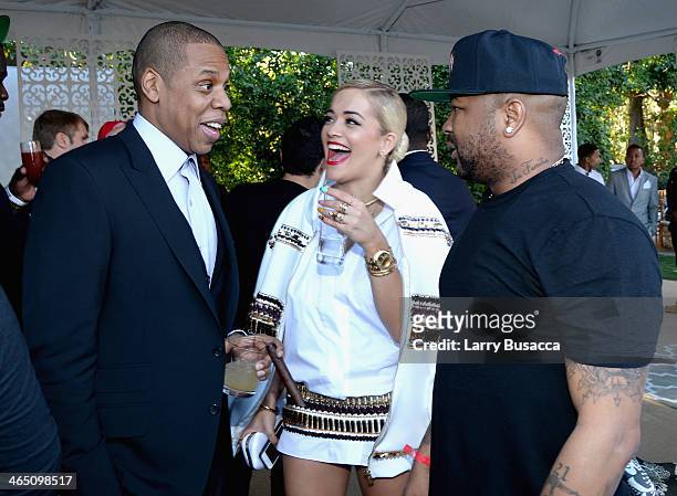 Rapper/producer Jay-Z, recording artist Rita Ora and guest attend the Roc Nation Pre-GRAMMY Brunch Presented by MAC Viva Glam at Private Residence on...