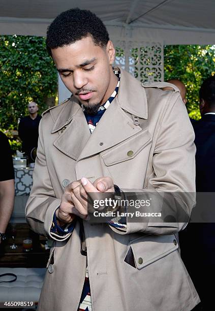 Rapper J. Cole attends the Roc Nation Pre-GRAMMY Brunch Presented by MAC Viva Glam at Private Residence on January 25, 2014 in Beverly Hills,...