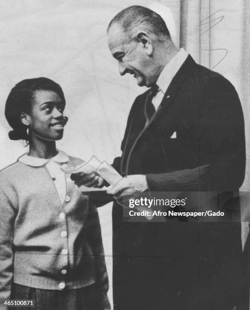 Lyndon Johnson meets with Linda Turnipseed, a girl who was cured of cancer, to launch the American Cancer Society's crusade, April 15, 1967.