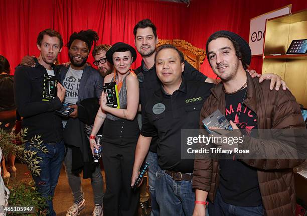 Musicians Simon Mavin, Paul Bender, Nai Palm, and Perrin Moss attend the GRAMMY Gift Lounge during the 56th Grammy Awards at Staples Center on...