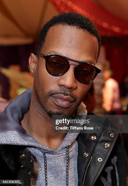 Rapper Juicy J wearing Carrera sunglasses with the Solstice Sunglasses and Safilo USA display at the GRAMMY Gift Lounge during the 56th GRAMMY Awards...