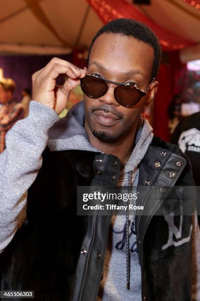 Rapper Juicy J wearing Carrera sunglasses with the Solstice Sunglasses and Safilo USA display at the GRAMMY Gift Lounge during the 56th GRAMMY Awards...