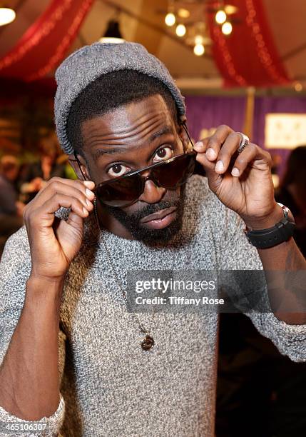 Singer Tye Tribbett wearing Carrera sunglasses with the Solstice Sunglasses and Safilo USA display at the GRAMMY Gift Lounge during the 56th GRAMMY...