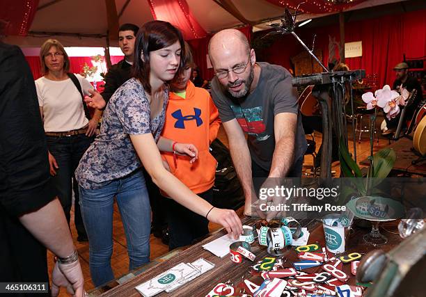 Musician Brad Wells with family attends the GRAMMY Gift Lounge during the 56th Grammy Awards at Staples Center on January 25, 2014 in Los Angeles,...