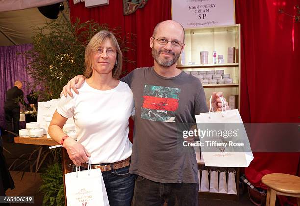 Musician Brad Wells and guest attend the GRAMMY Gift Lounge during the 56th Grammy Awards at Staples Center on January 25, 2014 in Los Angeles,...