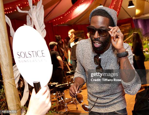 Singer Tye Tribbett wearing Marc by Marc Jacobs sunglasses with the Solstice Sunglasses and Safilo USA display at the GRAMMY Gift Lounge during the...