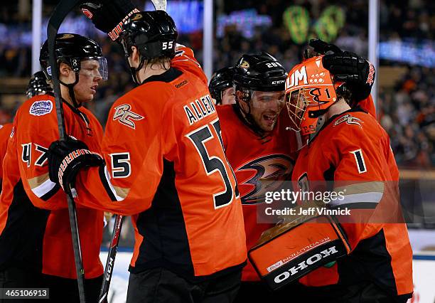 Hampus Lindholm, Bryan Allen, Mark Fistric and Jonas Hiller of the Anaheim Ducks celebrate their win over the Los Angeles Kings in the 2014 Coors...