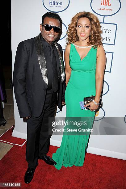 Recording artist Ron Isley and Kandy Isley attends the 56th annual GRAMMY Awards Pre-GRAMMY Gala and Salute to Industry Icons honoring Lucian Grainge...