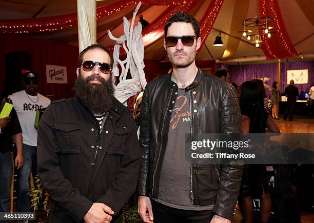 Recording artists Sebu Simonian and Ryan Merchant of Capital Cities both wearing Carrera sunglasses with the Solstice Sunglasses and Safilo USA...