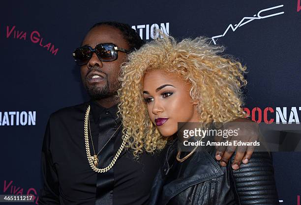 Rapper Wale and singer/songwriter K. Rose arrive at the Roc Nation Pre-GRAMMY Brunch presented by MAC Viva Glam on January 25, 2014 in Los Angeles,...