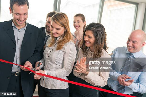 a group of business people at an ribbon cutting ceremony - opening event stock pictures, royalty-free photos & images