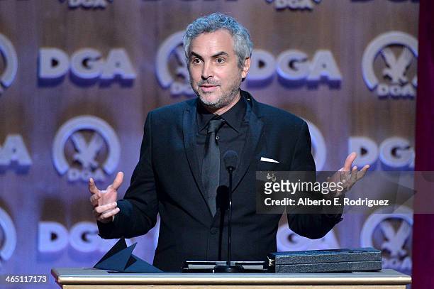 Director Alfonso Cuaron accepts the Outstanding Directorial Achievement in Feature Film for 2013 award for Gravity onstage at the 66th Annual...