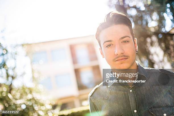 fashionable young adult posing serious - mustache stock pictures, royalty-free photos & images