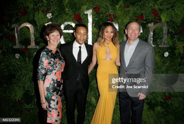 Barbara Calhoun, singer/songwriter John Legend, model Christine Teigen, and Dave Calhoun, Executive Chairman, Nielsen attend the Nielsen Pre-GRAMMY...