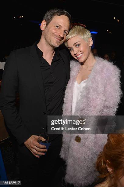 Producer Dr. Luke and recording artist Miley Cyrus attend the 56th annual GRAMMY Awards Pre-GRAMMY Gala and Salute to Industry Icons honoring Lucian...