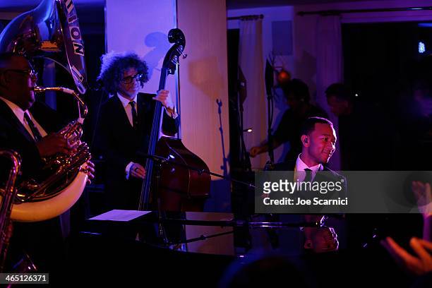 Singer/songwriter John Legend performs with Preservation Hall Jazz Band at the Nielsen Pre-GRAMMY Party at Mondrian Los Angeles on January 25, 2014...
