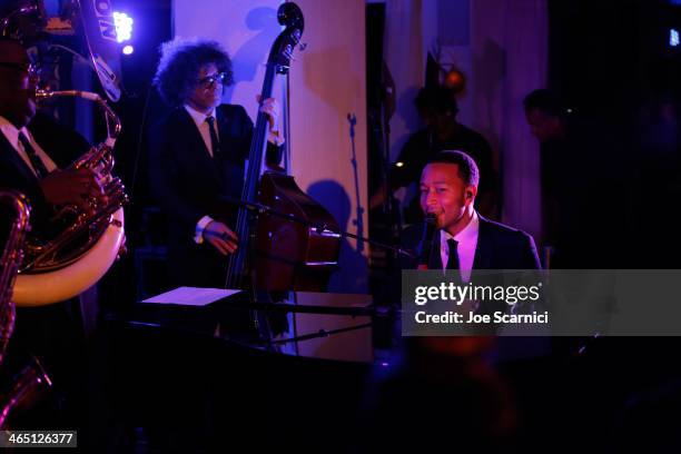 Singer/songwriter John Legend performs with Preservation Hall Jazz Band at the Nielsen Pre-GRAMMY Party at Mondrian Los Angeles on January 25, 2014...