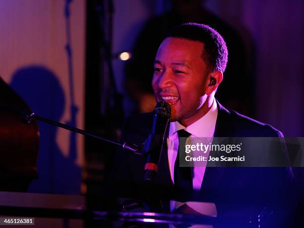 Singer/songwriter John Legend performs with Preservation Hall Jazz Band at the Nielsen Pre-GRAMMY Party at Mondrian Los Angeles on January 25, 2014...