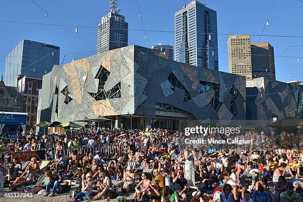 Large crowd watching the big screen at Federation Square ahead of the men's final match between Rafael Nadal of Spain and Stanislas Wawrinka of...