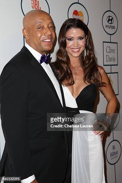 Russell Simmons and actress Shannon Elizabeth arrive at the 2014 HYUNDAI / GRAMMYs Clive Davis Pre-GRAMMY Gala Activation + Equus Fleet Arrivals at...