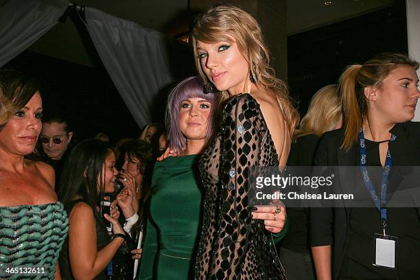Personality Kelly Osbourne and singer Taylor Swift arrive at the 2014 HYUNDAI / GRAMMYs Clive Davis Pre-GRAMMY Gala Activation + Equus Fleet Arrivals...