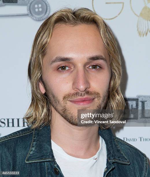 Singer/songwriter Isaiah Garnica attends Jason Of Beverly Hills' Pre-GRAMMY cocktail hour and salute to fashion icon David Thomas' Gentleman...