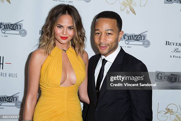 Model Christine Teigen and singer John Legend attend Jason Of Beverly Hills' Pre-GRAMMY cocktail hour and salute to fashion icon David Thomas'...