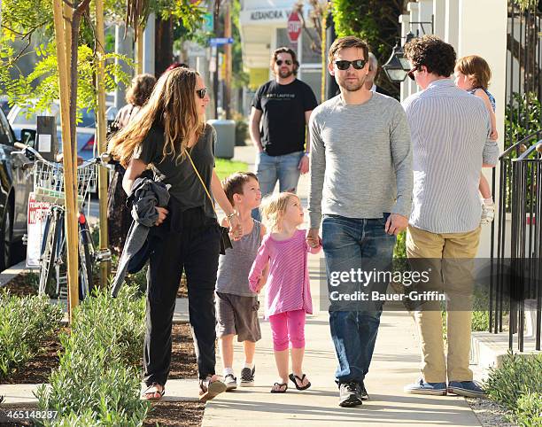 Tobey Maguire and Jennifer Meyer with their children Ruby Maguire and Otis Maguire are seen on January 25, 2014 in Los Angeles, California.