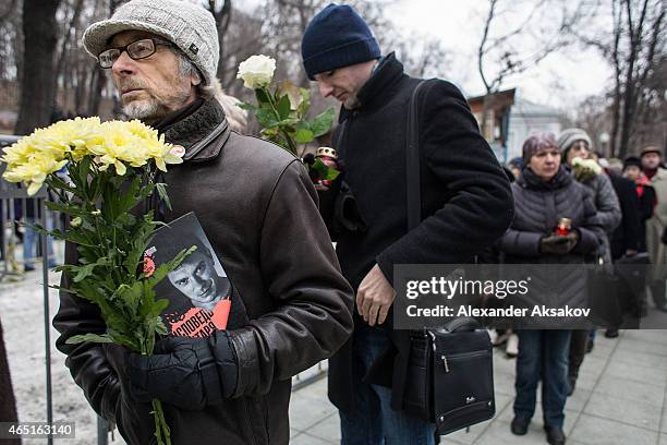 People wait in line before a farewell ceremony for Russian opposition leader Boris Nemtsov on March 3, 2015 in Moscow, Russia. Nemtsov was murdered...