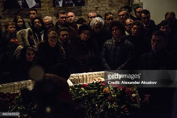 People pay their last respects at the coffin of Russian opposition leader Boris Nemtsov during a farewell ceremony at Sakharov Meseum on March 3,...