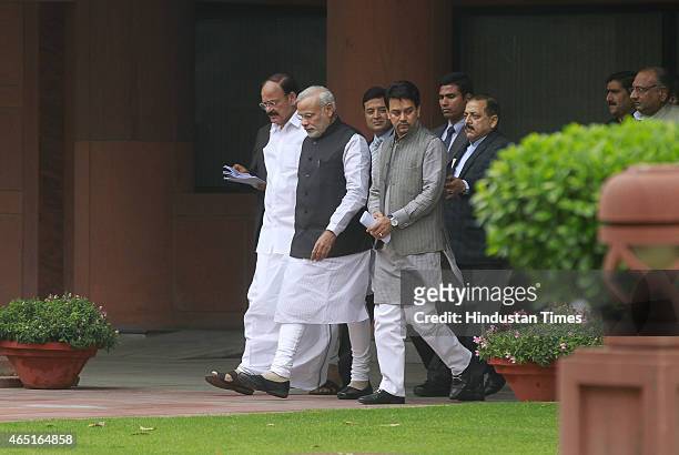 Prime Minister Narendra Modi with Parliamentary Affairs Minister M Venkaiah Naidu, MoS Jitendra Singh and BJP MP Anurag Thakur after the BJP...