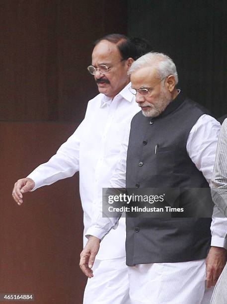 Prime Minister Narendra Modi with Parliamentary Affairs Minister M Venkaiah Naidu after the BJP Parliamentary Board meeting at the Parliament House...