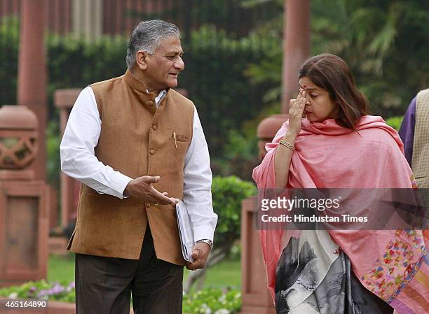 MPs Gen VK Singh and Meenakshi Lekhi after the BJP Parliamentary Board meeting during budget session at Parliament house on March 3, 2015 in New...